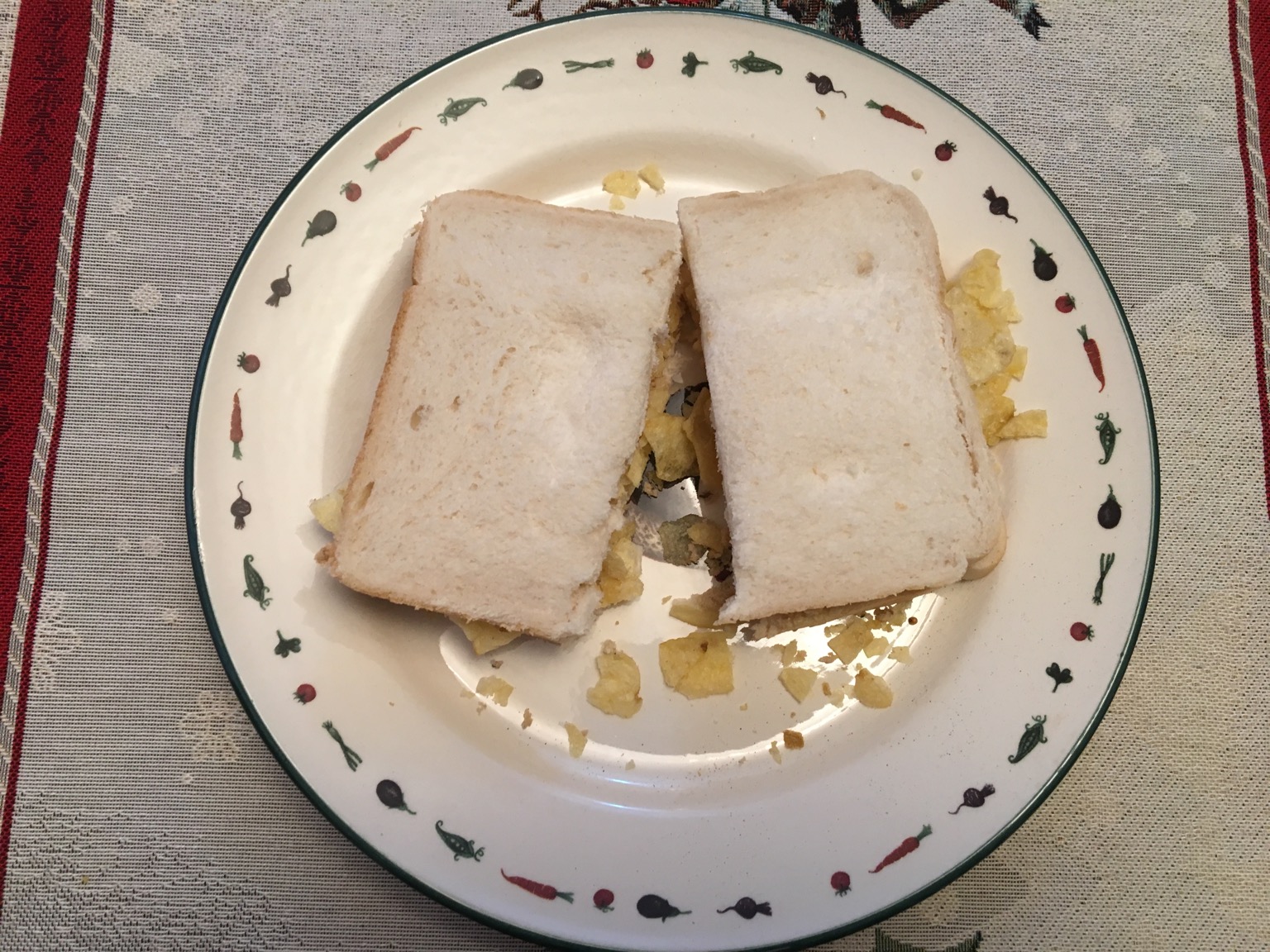 Overhead view of white crisp sandwich cut in half