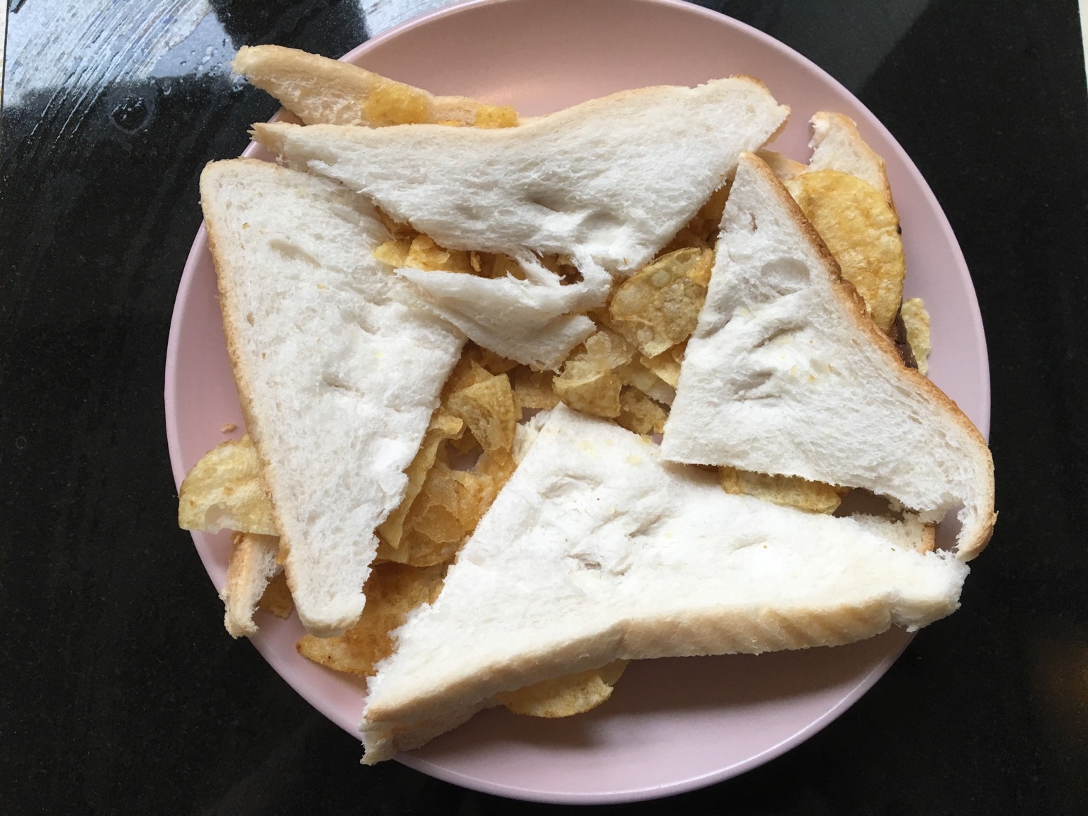 Diagonally-quartered white crisp sandwich